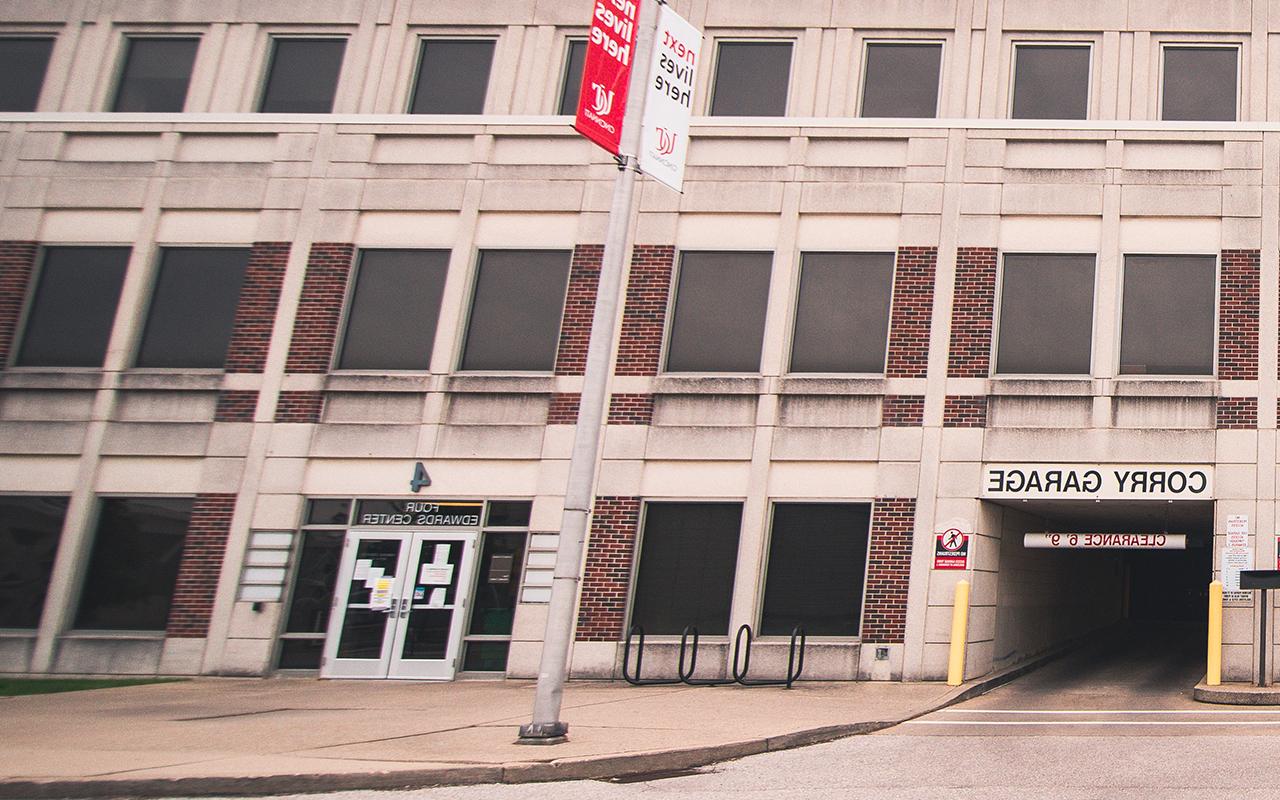 The parking office is adjacent to the entrance to Corry Garage. The entrance is to the right of the garage as you are facing it.